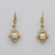 gold earrings with pearls and cubic zirconia